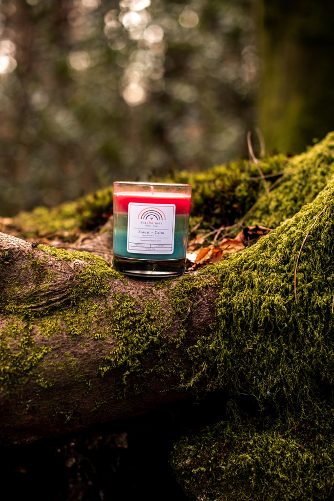 soy candle inspired by nature in the woods