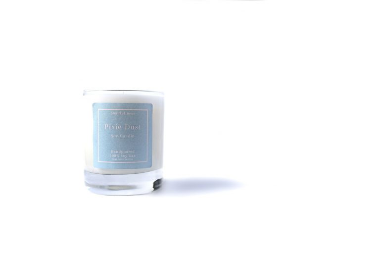 pixie dust candle on white background