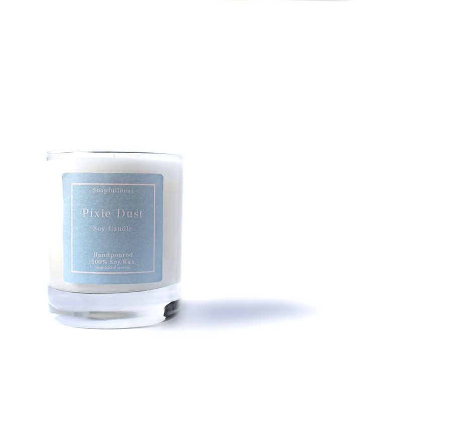 pixie dust candle on white background